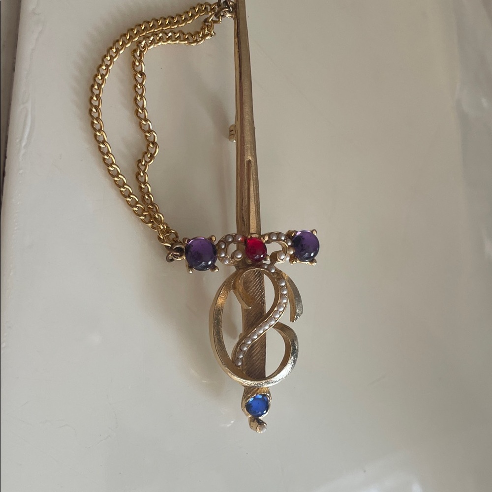 Elegant Gold Sword Brooch with Multicolor Gems